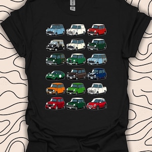May include: Black t-shirt with a pattern of various colored Mini Cooper cars. The cars are all different colors and styles, including red, green, blue, white, and orange.