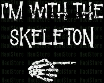May include: Black graphic with the text "I'M WITH THE SKELETON" in white, distressed font. A white skeleton hand points to the right. The background is black with a repeating pattern.