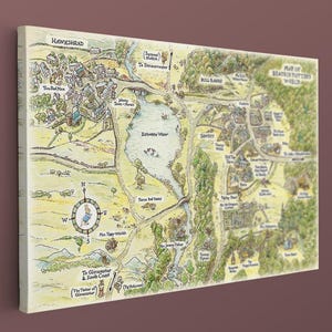 May include: A rectangular wall art print featuring a detailed, hand-drawn style map of a fictional landscape. The map includes a central lake, forested areas, winding paths, and various labelled locations with text, all rendered in muted yellow, green, and brown tones.