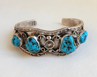 Bracelet manchette vintage épais turquoise en argent sterling Navajo avec motif serpent à l'arrière, 60 grammes, signé TS