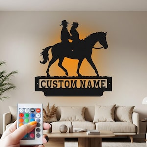 Aangepaste metalen muurkunst cowboy en cowgirl met led-licht