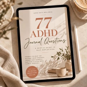 May include: A digital tablet displaying a cover page titled 77 ADHD Journal Questions, A Gentle Guide to Self-Reflection. The text includes prompts to help explore thoughts and mentions 30 bonus questions online in a circular badge.
