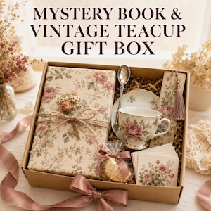 May include: A gift box containing a book wrapped in floral paper with a dried flower sprig, a vintage teacup and saucer with a floral pattern, a silver spoon, a floral bookmark with a tassel, and a small bag of cookies with floral note cards.