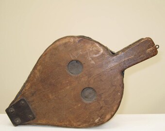 Old wood and leather fireplace bellows