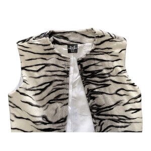 Vintage womens long animal print open vest from France, size S - M