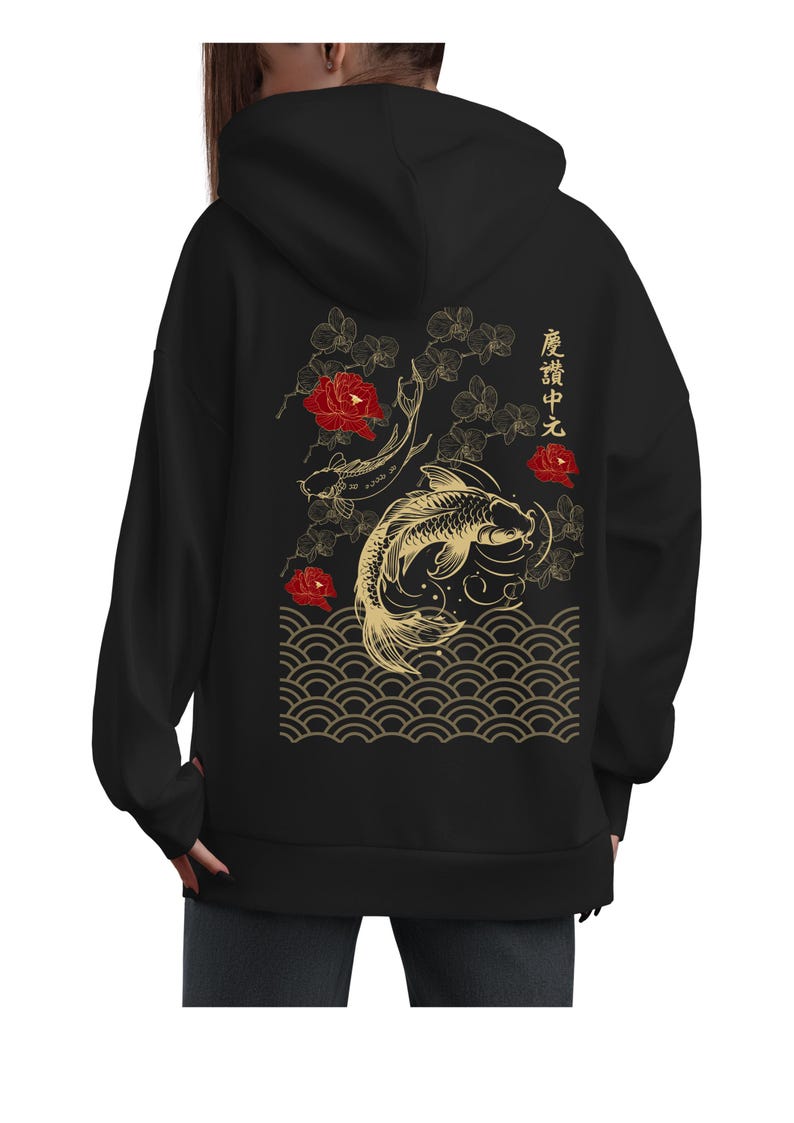 May include: Black hooded sweatshirt with a gold and red Japanese-inspired design featuring koi fish, flowers, and waves. The text "龍 騰 中 天" is printed on the back.