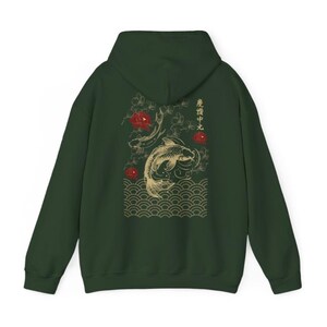 May include: A dark green hooded sweatshirt with a gold and red Japanese-inspired design featuring koi fish, waves, and flowers. The text on the back reads "魚心忠魂".