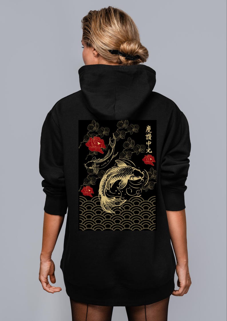 May include: Black hooded sweatshirt with a graphic print of gold koi fish swimming in a black and gold wave pattern with red flowers and the text "悠々自適" in gold.