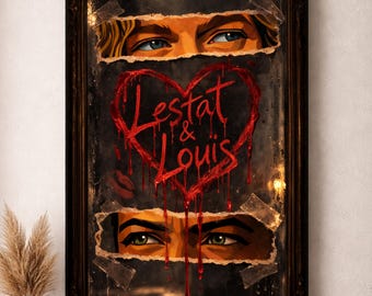 May include: Framed artwork featuring two sets of eyes peeking through torn paper. A red heart with the words "Lestat & Louis" is painted on the dark background. The artwork has a vintage, gothic aesthetic.
