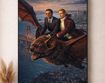May include: A framed art print depicts two people riding a giant bat over a city with a red bridge. The bat is brown with large wings. The people are wearing suits and coats. The background shows a city skyline and a sunset.
