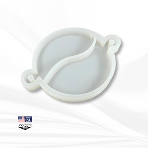 May include: White silicone mold shaped like a yin yang symbol. The mold has two separate compartments, each with a smooth, rounded surface. The mold is designed for creating resin crafts.