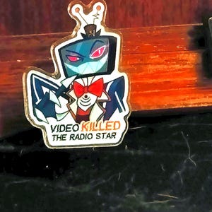 Vox acrylic pin
