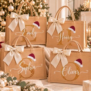 Bolsa de regalo navideña de yute personalizada: bolsa con inicial de gorro de Papá Noel con purpurina dorada, bolsa de regalo de Nochebuena con nombre personalizado.