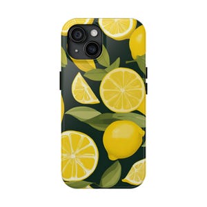 May include: A phone case featuring a vibrant lemon pattern. The design includes whole lemons, lemon slices, and green leaves against a dark background. The case has a glossy finish and a camera cutout.