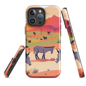 May include: A phone case featuring a desert landscape with donkeys. The design includes a sunset with red, orange, and yellow hues, along with cacti and donkeys in a field. The case is shown from multiple angles.
