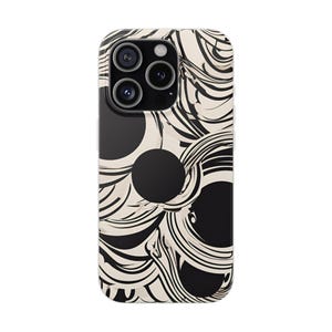May include: Black and white abstract phone case with a swirling pattern and three black circles.