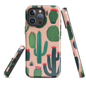 May include: A pink phone case with a cactus pattern. The case has a cutout for the camera lens and a raised lip around the edges to protect the screen.