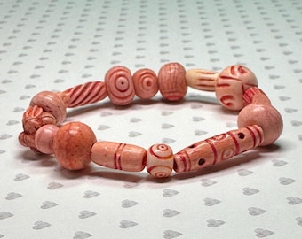 Etched Wooden Bead Stretch Bracelet: Light Pink Accessory