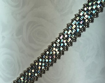 Iridescent Half-Tila Bead Bracelet – Handwoven Rainbow Sheen with Silver Edging