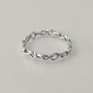 Bague coeur noué Pandora S925 ALE