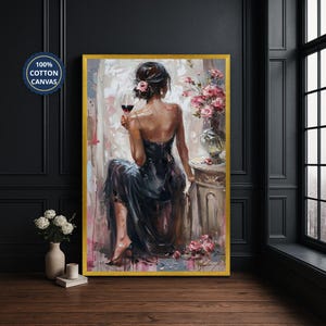 May include: An oil painting on 100% cotton canvas depicting a person with dark hair in a dark dress sitting and holding a wine glass. Beside them is a vase filled with pink flowers on a pedestal, with additional pink flowers scattered at the base.