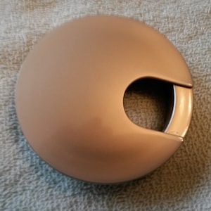 1 Cable Grommet Insert for a Desk or Table .. 3 x 2 7/16 x 1/2 .. SILVER and Brand new