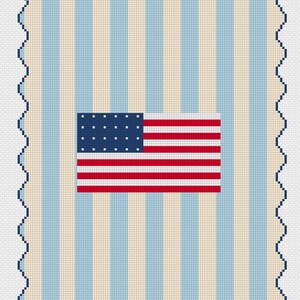 May include: A rectangular cross-stitch pattern featuring a central United States flag with red, white, and blue colors. The background consists of vertical light blue and cream stripes, framed by a dark blue scalloped edge border design.