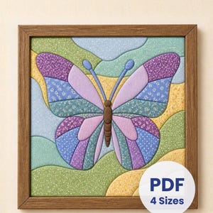 May include: A square framed wall art piece featuring a stylised butterfly with purple, blue, and green patterned fabric segments. The background consists of wavy, textured yellow, green, and blue sections. A white circular label displays PDF 4 Sizes.