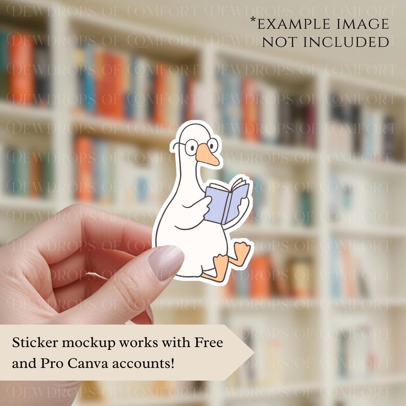 May include: A white sticker featuring a cartoon goose wearing glasses and reading a blue book. The sticker is held in a hand against a blurred background of bookshelves. Text on the image reads: "Sticker mockup works with Free and Pro Canva accounts!"