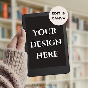 May include: A black tablet with the text "YOUR DESIGN HERE" in white. A circular graphic with the text "EDIT IN CANVA" is in the upper right corner. The tablet is held in a hand, with a blurred bookshelf background.