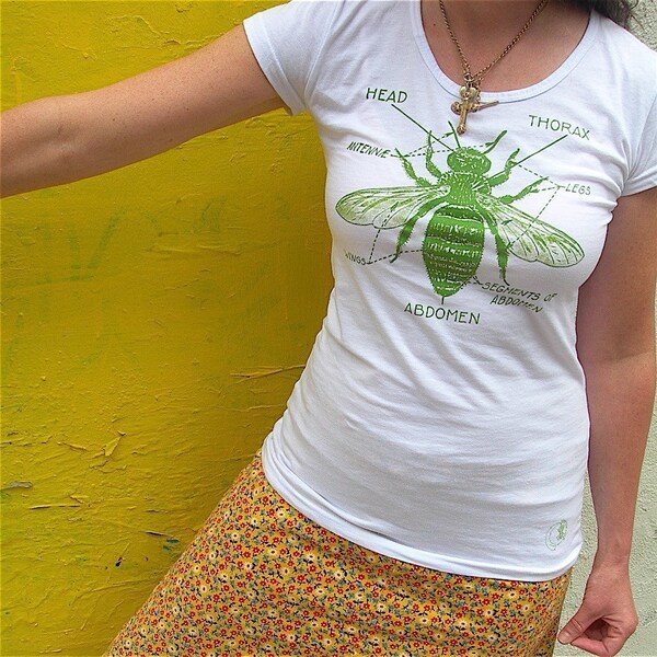 womens green on white bee sizes xs, m, xl.  EVOLUTION NOW.