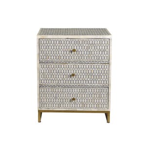 May include: A three-drawer nightstand with a geometric pattern in gray and cream. The cabinet has gold-colored hardware and legs. The drawers are adorned with a repeating oval design. A stylish piece of bedroom furniture.