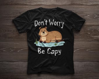 Nie martw się, bądź zabawnym miłośnikiem kapibary. Zwierzęcy przyjazny kapibarom. Wesoły, graficzny t-shirt ze zwierzętami.
