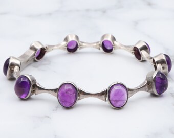 Vintage sterling silver link bracelet with amethyst cabochons