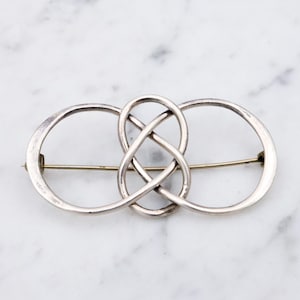 Vintage sterling elongated celtic knot brooch