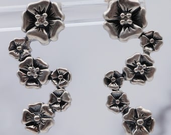 Vintage sterling & diamond flower earrings by “Lyric”