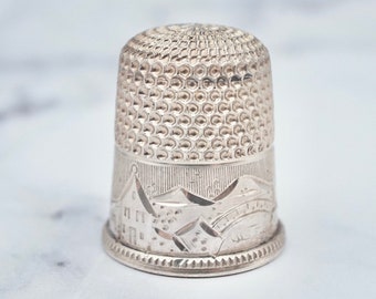 Antique Simons Brothers sterling size 7 thimble with engraved townscape detail