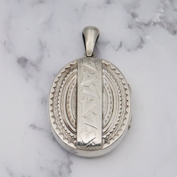 Antique Victorian engraved sterling locket