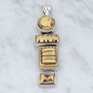 Retro Amy Kahn Russel sterling en gesneden pyriet hanger