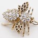 see more listings in the silver/costume brooches section