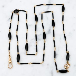 アンティーク ビクトリア朝の Carter, Gough & Co. 14k ゴールド ブラック エナメル バレル リンク ネックレス、「Y」ドロップとドッグ クリップ留め具付き