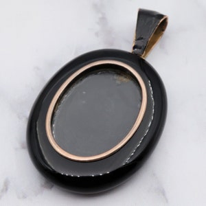 Antique victorian 18K gold and onyx mourning locket