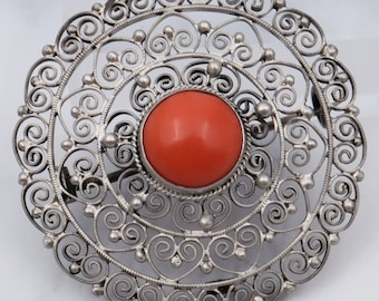 Antique Victorian .800 silver filigree round brooch with coral cabochon