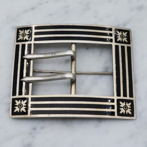 Antique Edwardian sterling silver and black enamel buckle brooch