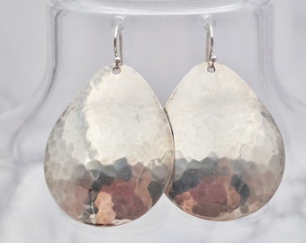 Vintage hand-hammered sterling disc earrings by Pearce