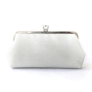 A shimmery silver clutch bag in silver mounted on a double metal frame in silver tone adorned with a centre 26mm diameter crystal in the centre.