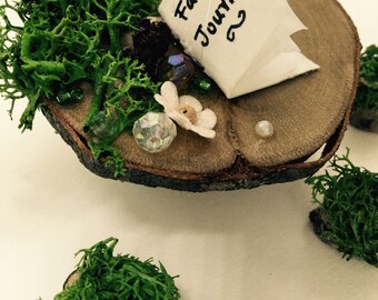 Enchanted woodland embellished Fairy table with three tree stump stools and Fairy Journal