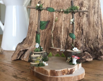 Foraged wood Fairy Swing in pretty garden