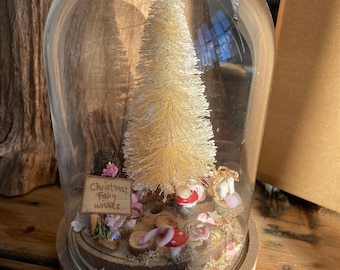 Fairy’s Christmas Tree in a glass dome with a light