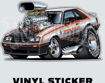 May include: A vinyl sticker featuring a caricature of a silver and black Ford Mustang Indy Pace Car with an oversized chrome engine blower protruding from the hood, large rear tires, and side exhaust pipes. The text reads OFFICIAL PACE CAR.